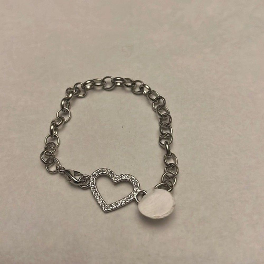 Handcrafted silver toned heart and chain bracelet